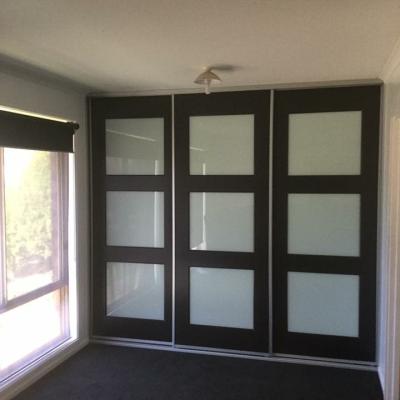 Homestead Double Midrail With Inlaid Opti Glass In A Three Door 